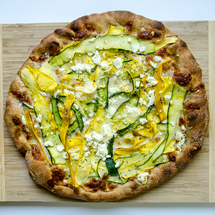 zucchini pizza with feta and garlic