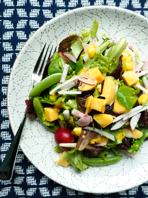 spring fever salad with mango sugar snaps and radishes