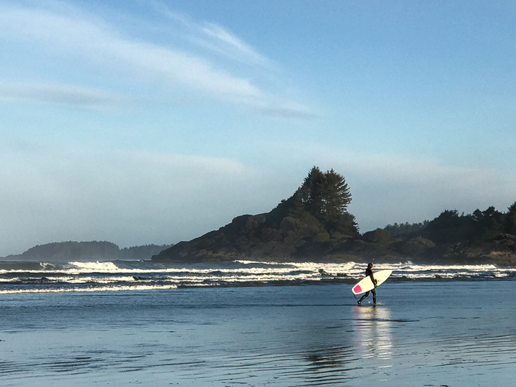 surfer on cox bay tofino bc