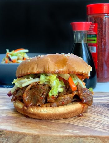 beef teriyaki burgers on a sesame bun with cabbage slaw