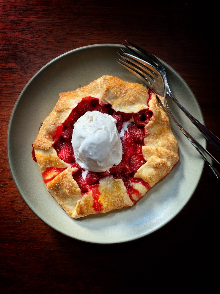 Raspberry Crostata with a scoop of anilla ice cream, one of my favorite summer berry desserts