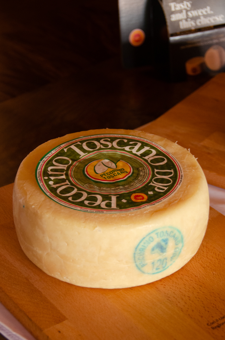 young pecorino toscano with a green label
