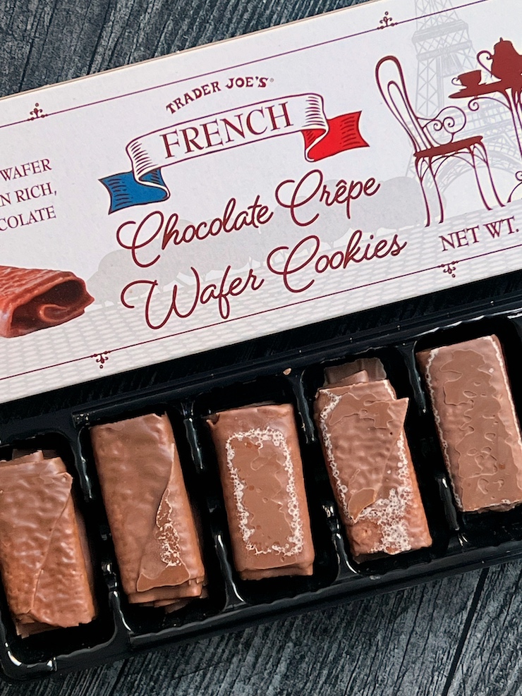 A rectangular box of Trader Joe's Chocolate Crepe Wafer cookies above the actual package of cookies. 