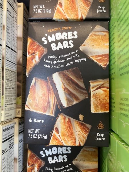 Trader Joe's S'mores Bars boxes shown in the freezer section of a Trader Joe's store. 