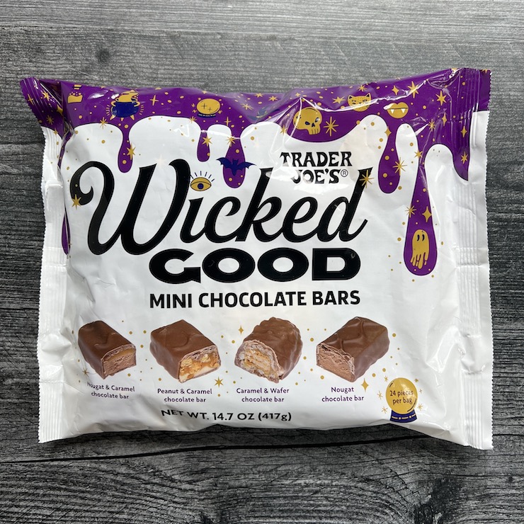 Bag of Trader Joe's Wicked Good Mini Chocolate Bars on a weathered wood background. 