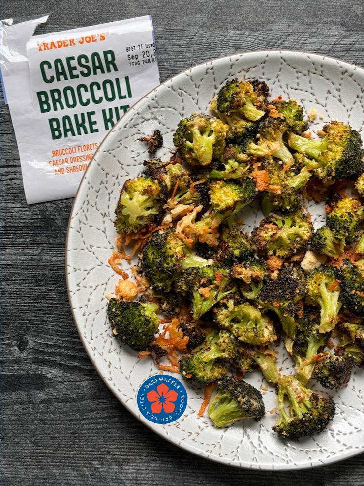 Overhead view of Trader Joe's Caesar Broccoli Kit as prepared and served on a white plate.