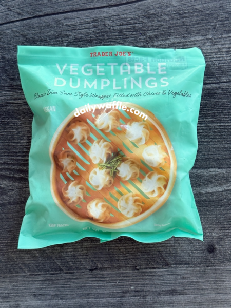 Trader Joe's Vegetable Dumplings bag. Reads "Classic Dim Sum Stye Wrapper Filled with Chives & Vegetables" and is marked Vegan.